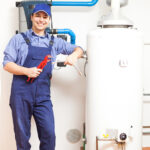 Technician Repairing An Hot water Heater Water Heater Repl Flickr